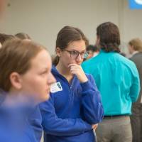 high school students from west michigan interacting with a presenter